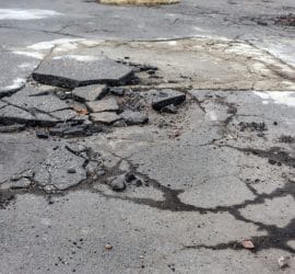 Without Government, Who Will Build the Roads? Domino’s Pizza, Apparently